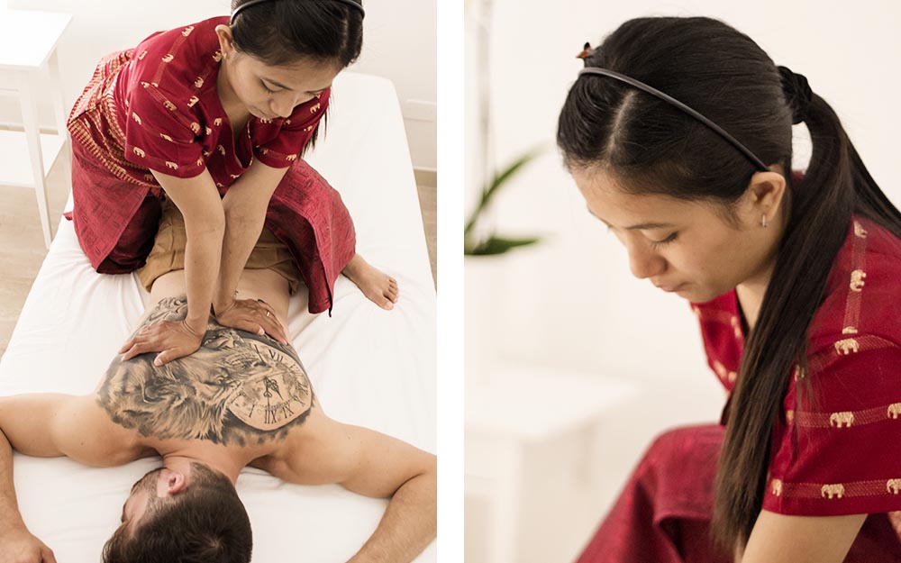 Dawrat Duangdee, titolare del Centro di Massaggio Thailandese My Thai esegue un massaggio su un cliente.